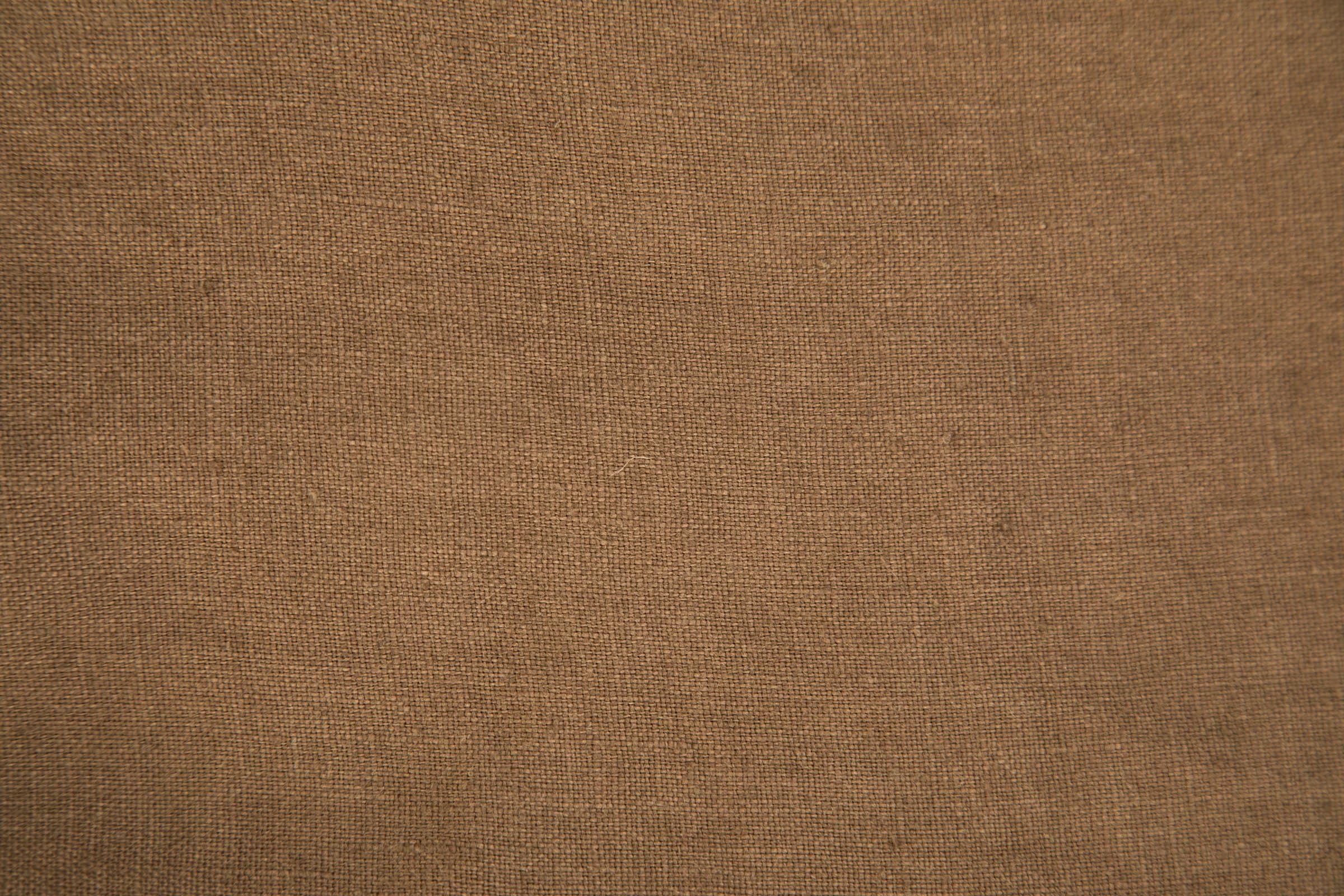 Close-up of a natural brown linen weave